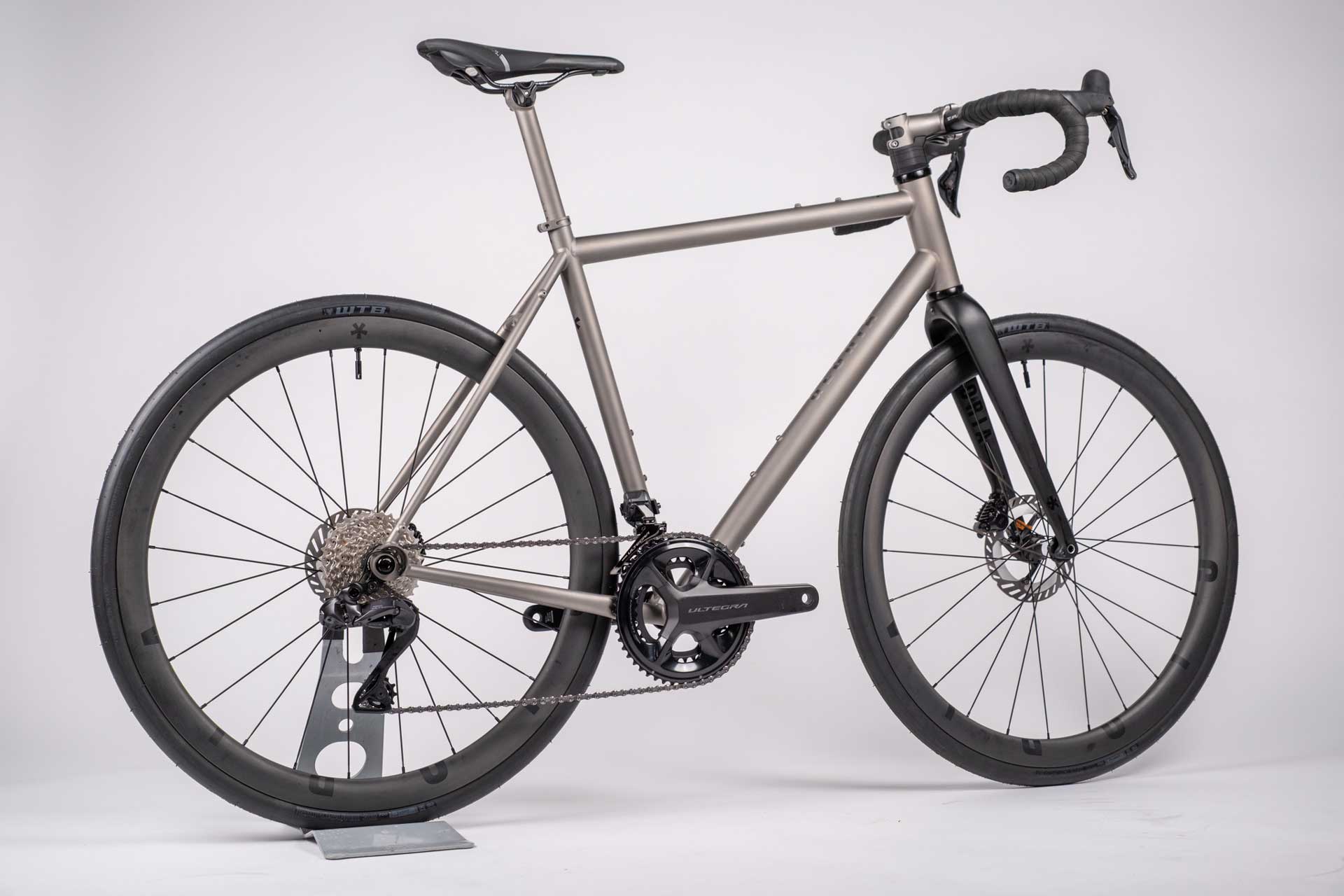 Gray bicycle on a white background