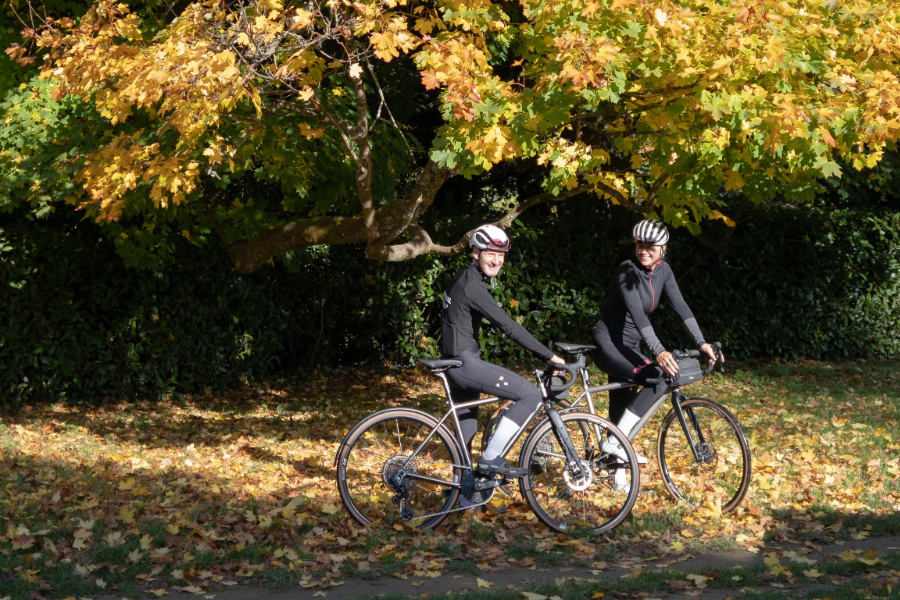 2 cyclists autumn riding