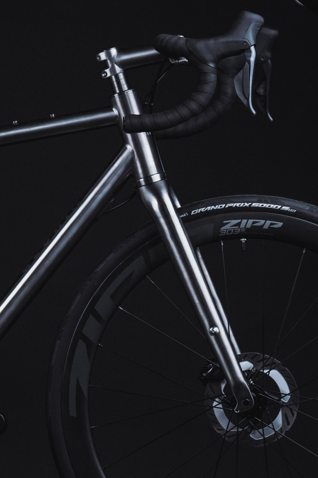 Bicycle frame with Zipp components on a black background