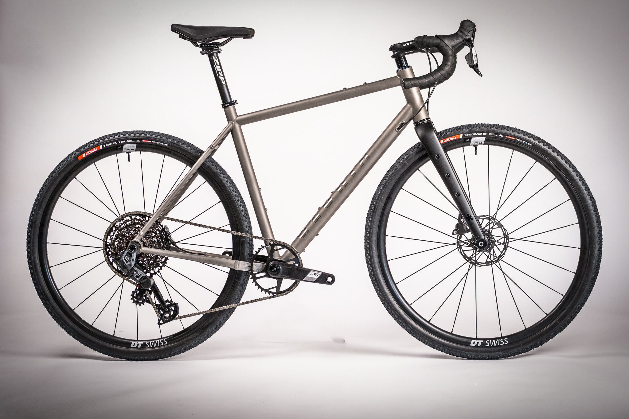 Titanium bicycle on a gray background