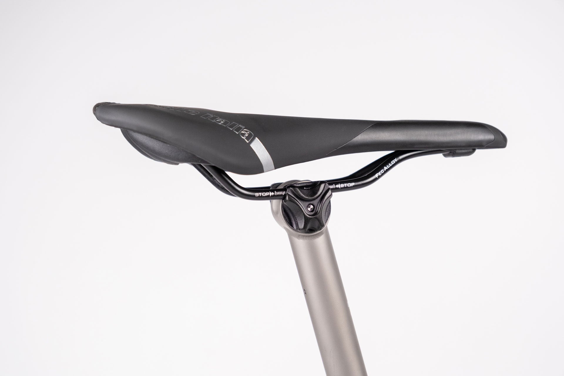 Close-up of a bicycle seat with a white background