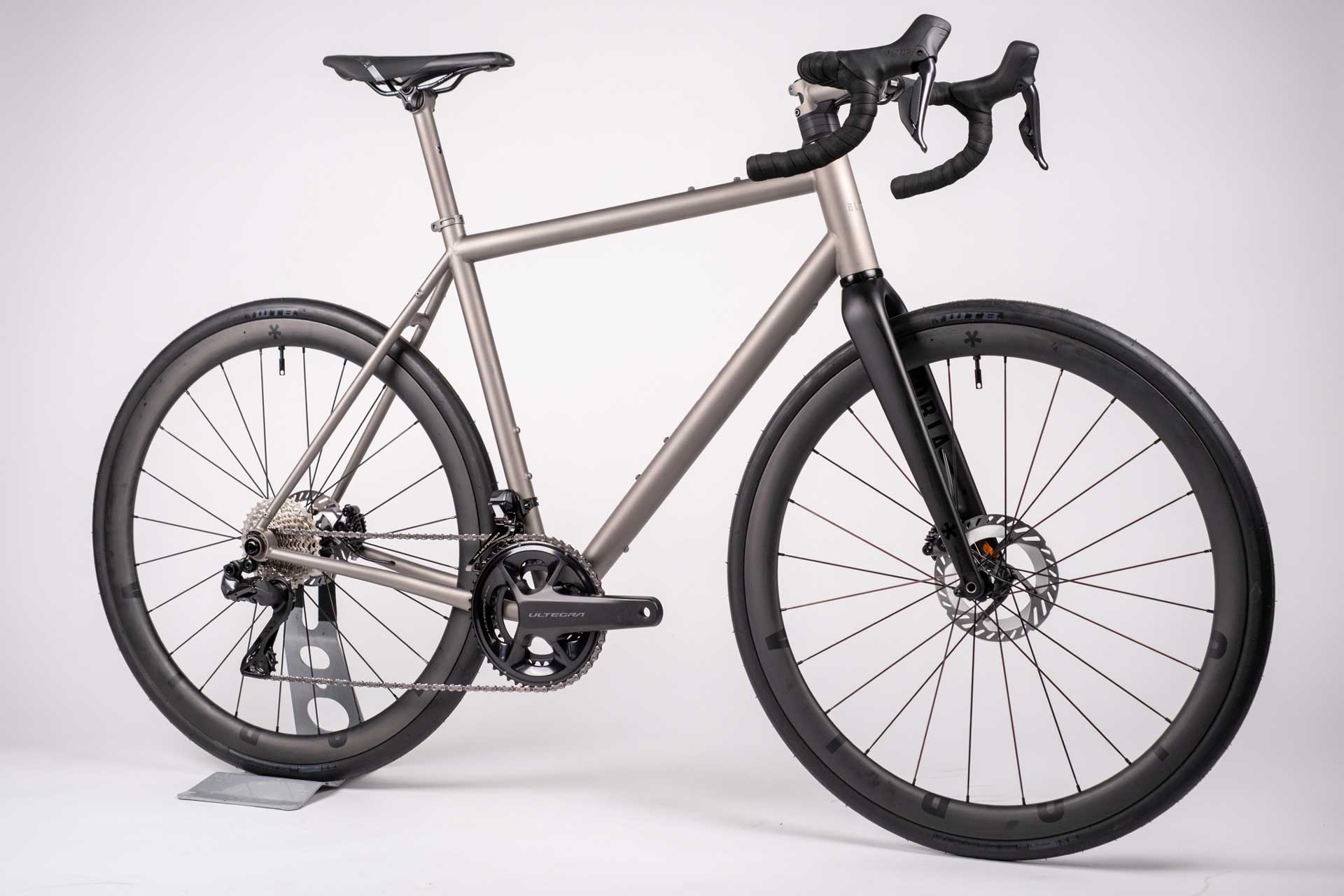 Gray bicycle on a white background