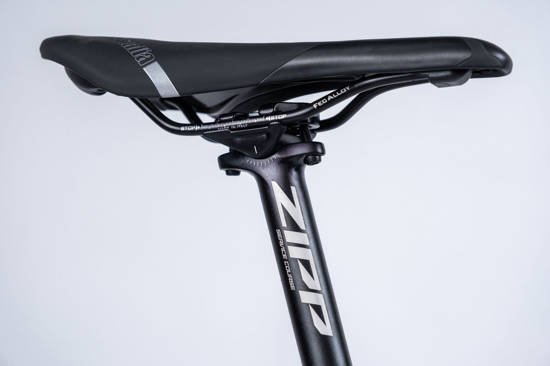 Bicycle seat with Zipp logo on a light gray background