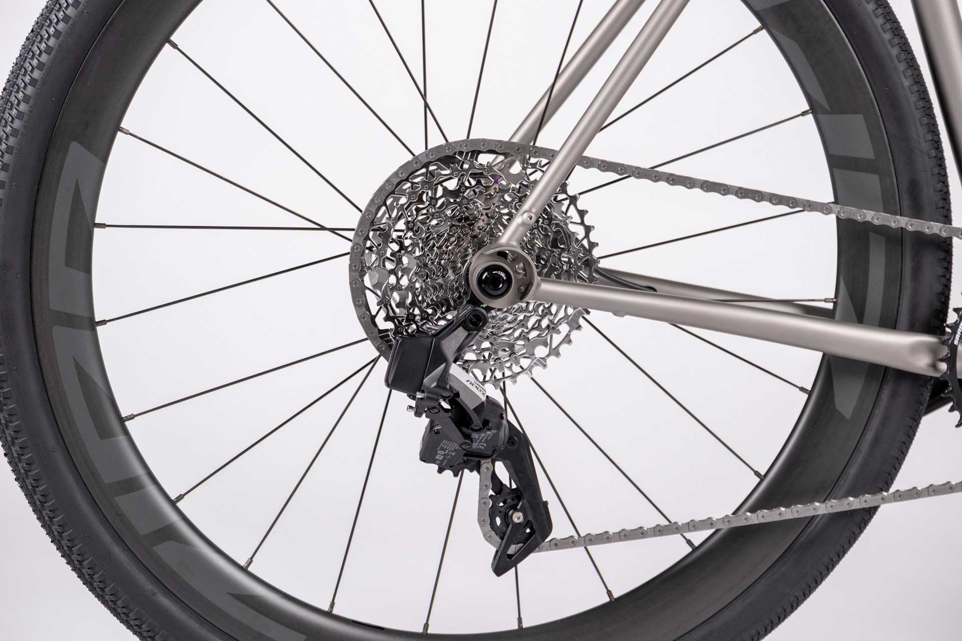 Close-up of a bicycle wheel with gear and chain details
