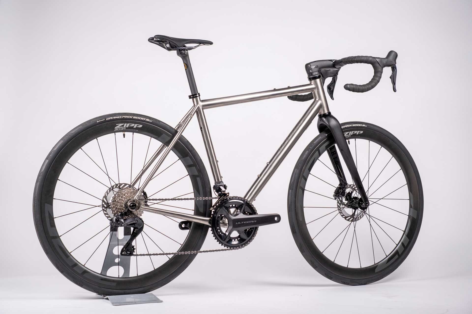 Silver bicycle on a white background