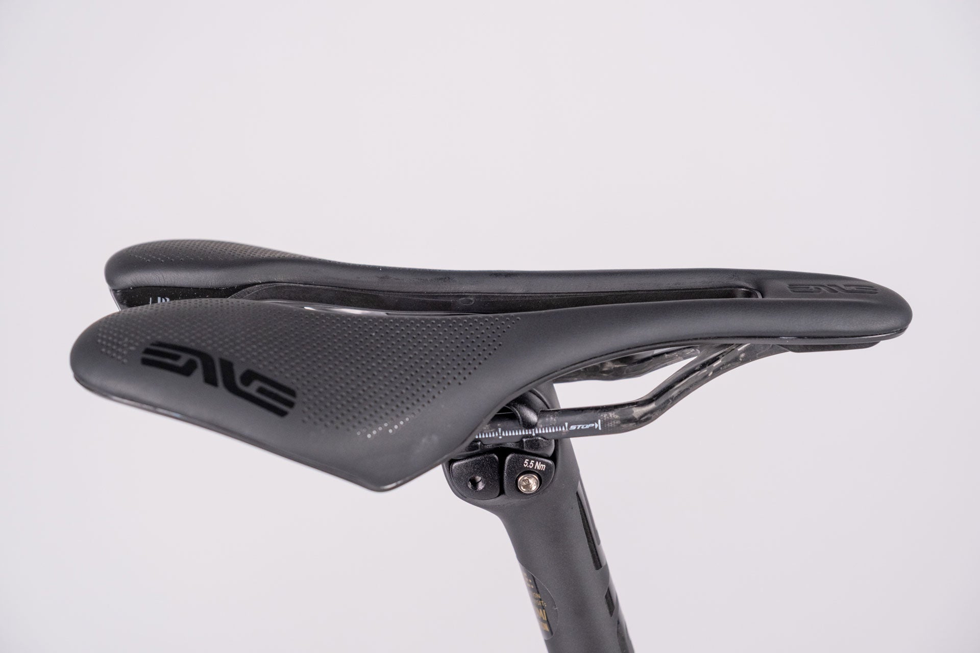 Cycling saddle with ENVE logo on a light gray background